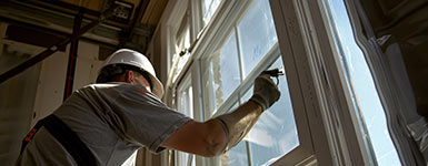 NJ Window Repair Services - Man makin a window repair.